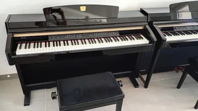 Werkstattgeprüftes Yamaha Clavinova CLP-240 E-Piano mit 1 Jahre Garantie und Klavierbank