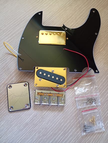 Telecaster loaded pickguard med neckplate