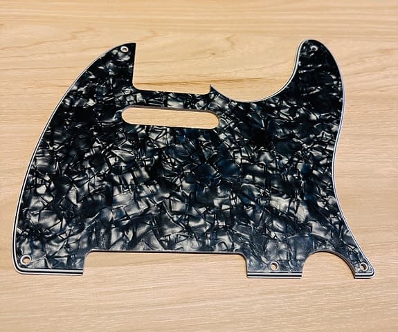 Telecaster pickguard i Black Pearloid.