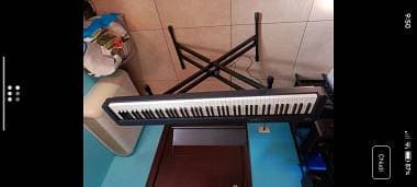 pianola Casio s100