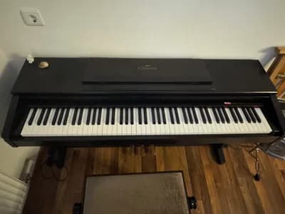 Yamaha Clavinova CLP-570 Digitalpiano inkl. Klavierstuhl - voll funktionsfähig