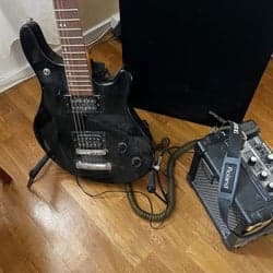 Elgitarr med Roland Micro Cube förstärkare