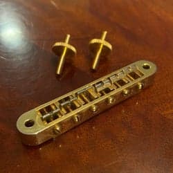 Gretsch Electromatic Adjust-O-Matic bridge, gold. Tune-a-matic stall gitarrstall