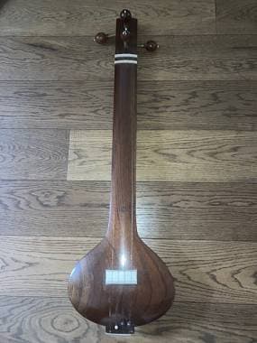 Tanpura flat indiana femminile