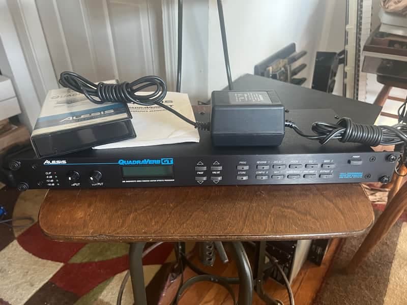 Alesis QuadraVerb GT 20k Bandwidth Simultaneous Guitar Effects Processor with power supply, rack mount bolts & washers, owners manual and VHS.