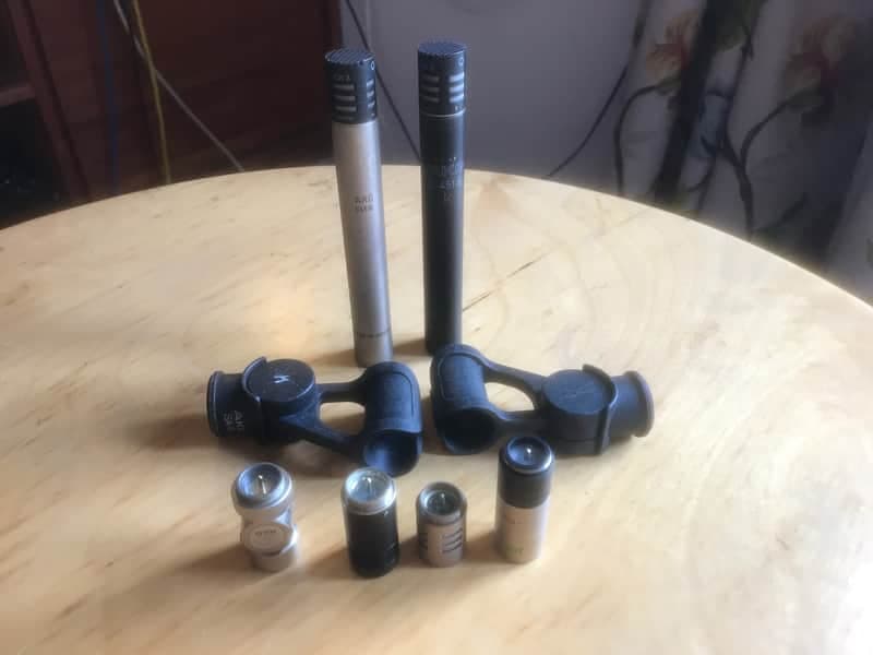 Pair of AKG C451 E -clamps, extra capsules, pads and swivel head