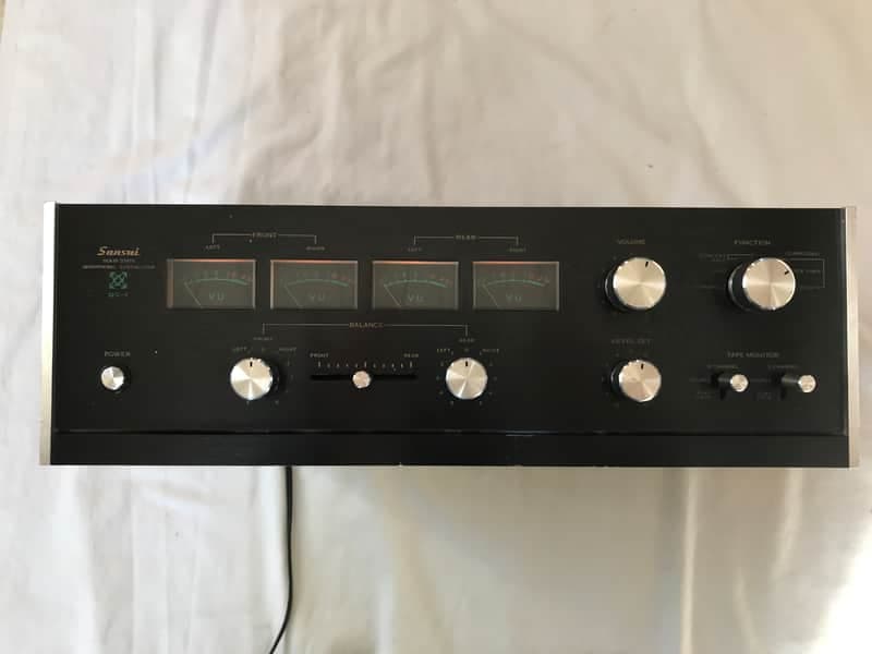 Sansui QS-1 1970’s - Black brushed aluminum faceplate, walnut finished veneer top and side